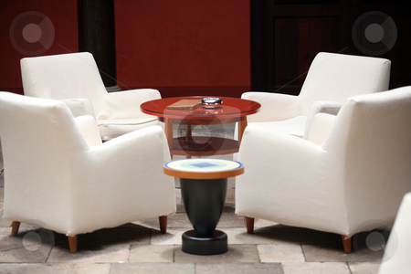 Cafe interior Cafe interior stock photo, Cafe indoor with white sofas and blue glass small table by Tomas Hajek