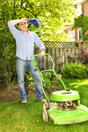 To use this stock image in your creative project, please select the size you need over to the right and click the "Add to Cart" button.
Your downloaded image will come with the Cutcaster watermark removed so don’t worry about the watermark you see on this page. Man mowing lawn stock photo, Man taking a break while mowing lawn on hot summer day by Elena Elisseeva