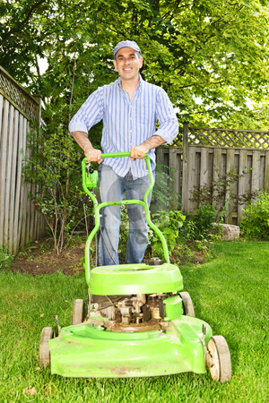 To use this stock image in your creative project, please select the size you need over to the right and click the "Add to Cart" button.
Your downloaded image will come with the Cutcaster watermark removed so don’t worry about the watermark you see on this page. Man mowing lawn stock photo, Man with lawn mower in landscaped backyard by Elena Elisseeva