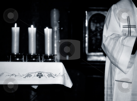 Mass Mass stock photo, Catholic Priest and the altar during Mass , black and white photo by Gordan Poropat