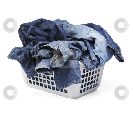Jeans Jeans stock photo, A Laundy basket filled with only jeans. Isolated on white with natural shadows. by Stocksnapper