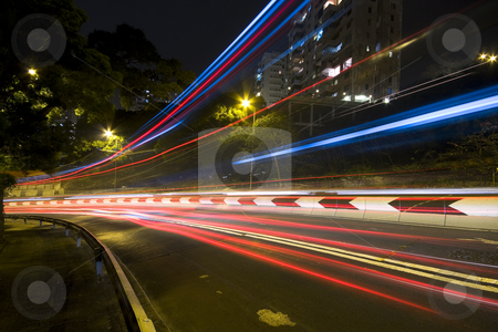 Traffic in city at night in hong kong Traffic in city at night in hong kong stock photo, Traffic in city at night in hong kong by Keng po Leung
