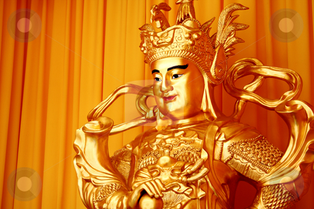 To use this stock image in your creative project, please select the size you need over to the right and click the "Add to Cart" button.
Your downloaded image will come with the Cutcaster watermark removed so don’t worry about the watermark you see on this page. Buddha stock photo, Tradition chinese male buddha with gold toned by Keng po Leung