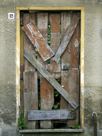 Door-nailed and blocked up Door-nailed and blocked up stock photo, Door in an old house - blocked up and nailed by Heike Jestram