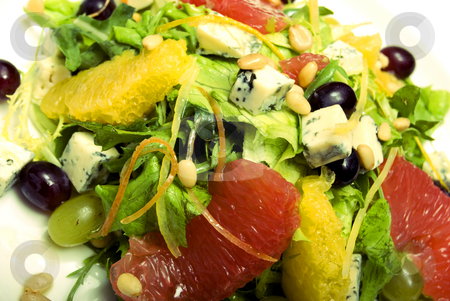 To use this stock image in your creative project, please select the size you need over to the right and click the "Add to Cart" button.
Your downloaded image will come with the Cutcaster watermark removed so don’t worry about the watermark you see on this page. Summer salad stock photo, Salad made of citrus, grape and cheese by Kirill Kedrinski