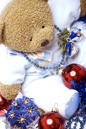 To use this stock image in your creative project, please select the size you need over to the right and click the "Add to Cart" button.
Your downloaded image will come with the Cutcaster watermark removed so don’t worry about the watermark you see on this page. Soft bear with Christmas decorations stock photo, Soft bear with Christmas balls, bells, flowers and garland by Kirill Kedrinski