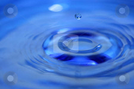 To use this stock image in your creative project, please select the size you need over to the right and click the "Add to Cart" button.
Your downloaded image will come with the Cutcaster watermark removed so don’t worry about the watermark you see on this page. Water droplet stock photo, A Blue water droplet falling by Jim Mills