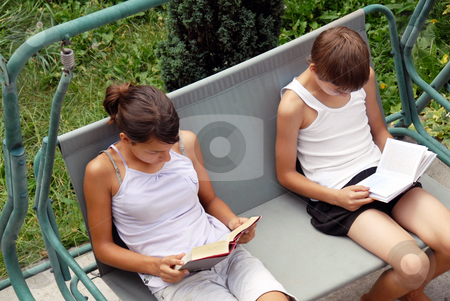 Teen girl and boy reading stock photo, Teen girl and boy reading books