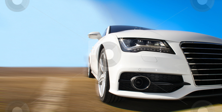 To use this stock image in your creative project, please select the size you need over to the right and click the "Add to Cart" button.
Your downloaded image will come with the Cutcaster watermark removed so don’t worry about the watermark you see on this page. Fast Car stock photo, White Sports Car on a colorful background by Viktor Thaut
