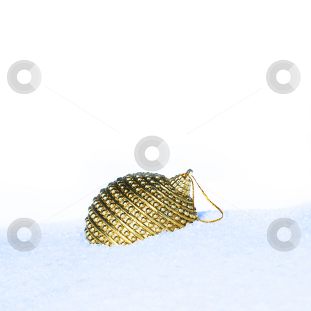 To use this stock image in your creative project, please select the size you need over to the right and click the "Add to Cart" button.
Your downloaded image will come with the Cutcaster watermark removed so don’t worry about the watermark you see on this page. Christmas bauble scene stock photo, Golden christmas bauble in snow by Viktor Thaut