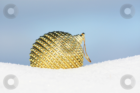Golden bauble Golden bauble stock photo, Christmas ball in snow by Viktor Thaut