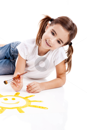 Painting a happy sun Painting a happy sun stock photo, Girl lying on floor and painting a happy sun by ikostudio