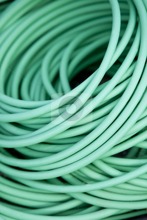 Close up on a green garden hose Close up on a green garden hose stock photo, Close up on a green garden hose by Anne-Louise Quarfoth