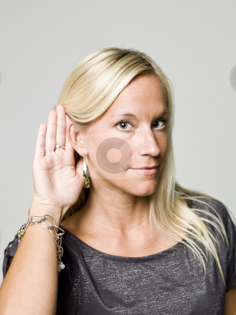 Portrait of a woman listening Portrait of a woman listening stock photo, Portrait of a woman listening by Anne-Louise Quarfoth