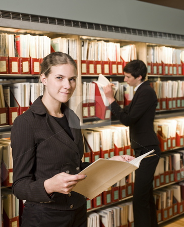 To use this stock image in your creative project, please select the size you need over to the right and click the "Add to Cart" button.
Your downloaded image will come with the Cutcaster watermark removed so don’t worry about the watermark you see on this page. Two women at a library stock photo, Two women at a library by Anne-Louise Quarfoth