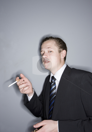 Young man smoking Young man smoking stock photo, Young man smoking by Anne-Louise Quarfoth