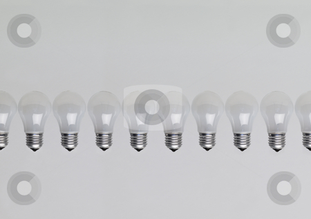 To use this stock image in your creative project, please select the size you need over to the right and click the "Add to Cart" button.
Your downloaded image will come with the Cutcaster watermark removed so don’t worry about the watermark you see on this page. Row of light bulbs stock photo, Row of light bulbs by Anne-Louise Quarfoth