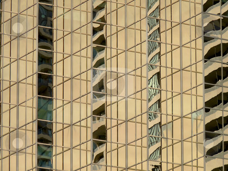 To use this stock image in your creative project, please select the size you need over to the right and click the "Add to Cart" button.
Your downloaded image will come with the Cutcaster watermark removed so don’t worry about the watermark you see on this page. Golden Building stock photo, Reflections of one building in the golden glass of another. by Mary Lane