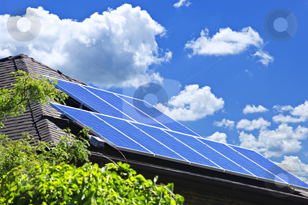 Solar panels Solar panels stock photo, Array of alternative energy photovoltaic solar panels on roof of residential house by Elena Elisseeva