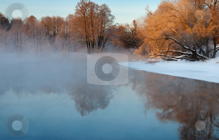 To use this stock image in your creative project, please select the size you need over to the right and click the "Add to Cart" button.
Your downloaded image will come with the Cutcaster watermark removed so don’t worry about the watermark you see on this page. Frosty winter morning stock photo, Dawn frosty day in February, the fog and sun by Vladimir Blinov
