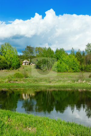 Cloud over the river Cloud over the river stock photo, Cloud in the sky over the river Vilija in the spring afternoon. by Vladimir Blinov