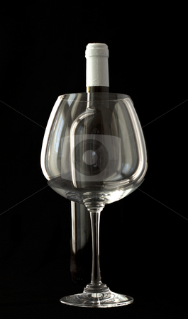 To use this stock image in your creative project, please select the size you need over to the right and click the "Add to Cart" button.
Your downloaded image will come with the Cutcaster watermark removed so don’t worry about the watermark you see on this page. Wine stock photo, Voluntarily underexposed image of a great glass in front of a wine bottle by Fabio Alcini