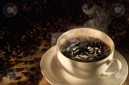 cutcaster-photo-100911031-Coffe-cup-and-beans.jpg