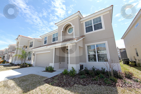 To use this stock image in your creative project, please select the size you need over to the right and click the "Add to Cart" button.
Your downloaded image will come with the Cutcaster watermark removed so don’t worry about the watermark you see on this page. Florida Home stock photo, A Front Exterior of a Florida Home by Lucy Clark