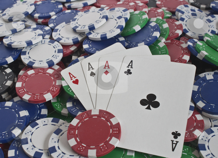 To use this stock image in your creative project, please select the size you need over to the right and click the "Add to Cart" button.
Your downloaded image will come with the Cutcaster watermark removed so don’t worry about the watermark you see on this page. Four aces and poker chips stock photo, Loads of poker chips with winning hand of four aces by Stephen Clarke