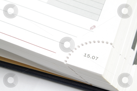 To use this stock image in your creative project, please select the size you need over to the right and click the "Add to Cart" button.
Your downloaded image will come with the Cutcaster watermark removed so don’t worry about the watermark you see on this page. A corner of diary stock photo, A corner of a diary page with date on it by Olena Pupirina