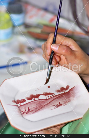 To use this stock image in your creative project, please select the size you need over to the right and click the "Add to Cart" button.
Your downloaded image will come with the Cutcaster watermark removed so don’t worry about the watermark you see on this page. Portuguese painter. stock photo, Portuguese traditional ceramics painter. by Inacio Pires