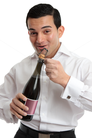 To use this stock image in your creative project, please select the size you need over to the right and click the "Add to Cart" button.
Your downloaded image will come with the Cutcaster watermark removed so don’t worry about the watermark you see on this page. Happy man opening sparkling wine or champagne stock photo, Happy man or waiter opening a bottle of alcohol, wine or champagne for a celebration or special occasion. by Leah-Anne Thompson