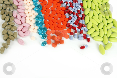 Colorful Pills Colorful Pills stock photo, Many different pills lined up on a white background. by pinkarmy25