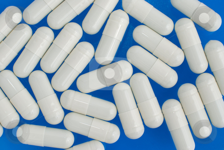 To use this stock image in your creative project, please select the size you need over to the right and click the "Add to Cart" button.
Your downloaded image will come with the Cutcaster watermark removed so don’t worry about the watermark you see on this page. White pills stock photo, Macro view of white pills on blue background. by Homydesign