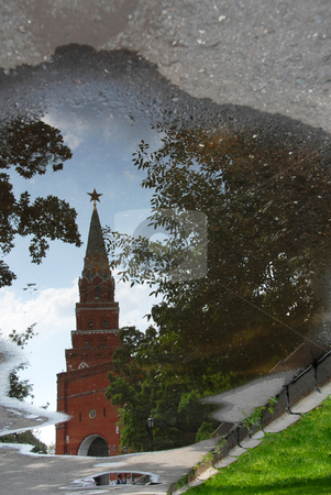 The Kremlin Borovitskaya tower on Red Square in Moscow The Kremlin Borovitskaya tower on Red Square in Moscow stock photo, The Kremlin Borovitskaya tower, Moscow, Russia, mirrored in pool by Julija Sapic