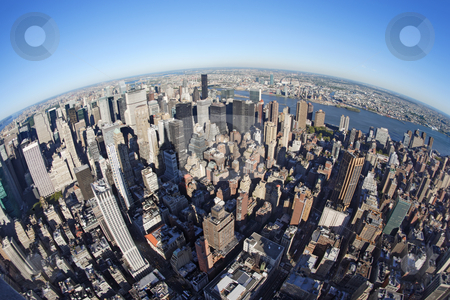 To use this stock image in your creative project, please select the size you need over to the right and click the "Add to Cart" button.
Your downloaded image will come with the Cutcaster watermark removed so don’t worry about the watermark you see on this page. New York cityscape with fisheye stock photo, Photo of New York city taken from the Empire State Building with a fisheye lens.
by © Ron Sumners