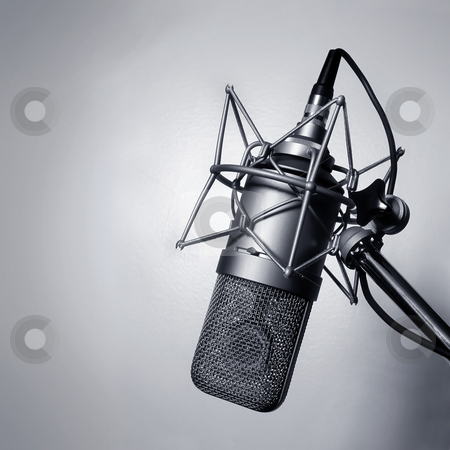 To use this stock image in your creative project, please select the size you need over to the right and click the "Add to Cart" button.
Your downloaded image will come with the Cutcaster watermark removed so don’t worry about the watermark you see on this page. Studio microphone stock photo, Black and white image of a studio microphone. by © Ron Sumners