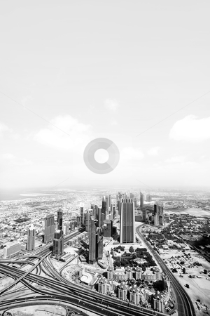 To use this stock image in your creative project, please select the size you need over to the right and click the "Add to Cart" button.
Your downloaded image will come with the Cutcaster watermark removed so don’t worry about the watermark you see on this page. Dubai view stock photo, Black and white picture of the view over Dubai cityscape by Kjersti Jorgensen