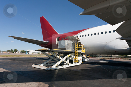 To use this stock image in your creative project, please select the size you need over to the right and click the "Add to Cart" button.
Your downloaded image will come with the Cutcaster watermark removed so don’t worry about the watermark you see on this page. Loading cargo plane stock photo, Loading platform of air freight to the aircraft by Pierre-Yves Babelon