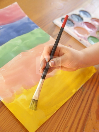 To use this stock image in your creative project, please select the size you need over to the right and click the "Add to Cart" button.
Your downloaded image will come with the Cutcaster watermark removed so don’t worry about the watermark you see on this page. Painting stock photo, a child painting with water colors by Lars Kastilan
