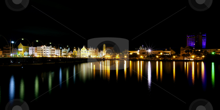 To use this stock image in your creative project, please select the size you need over to the right and click the "Add to Cart" button.
Your downloaded image will come with the Cutcaster watermark removed so don’t worry about the watermark you see on this page. Willemstad stock photo, Nighttime panorama picture of Willemstad city, Curacao by Kjersti Jorgensen