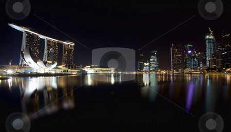 To use this stock image in your creative project, please select the size you need over to the right and click the "Add to Cart" button.
Your downloaded image will come with the Cutcaster watermark removed so don’t worry about the watermark you see on this page. Singapore skyline stock photo, Night scene of financial district,Singapore. From the river. by Kjersti Jorgensen
