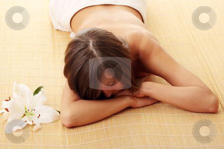 Teen girl relaxing in massage Teen girl relaxing in massage stock photo, Young woman (teen girl) relaxing in massage by Piotr_Marcinski