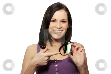Pregnancy test Pregnancy test stock photo, Smiling woman holding a pregnancy test, isolated on white by Piotr_Marcinski