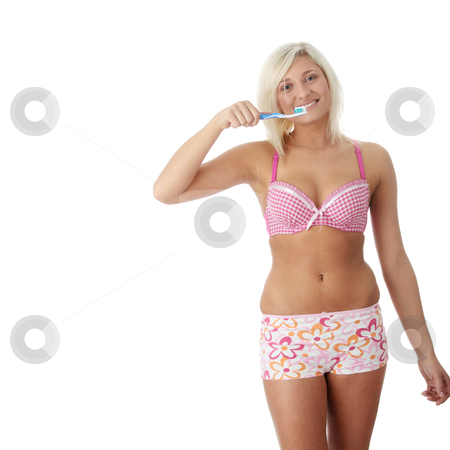 To use this stock image in your creative project, please select the size you need over to the right and click the "Add to Cart" button.
Your downloaded image will come with the Cutcaster watermark removed so don’t worry about the watermark you see on this page. Young girl brushing her teeth happily stock photo, Young girl brushing her teeth happily, isolated by Piotr_Marcinski