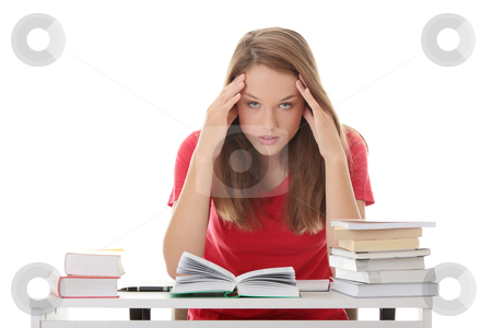 To use this stock image in your creative project, please select the size you need over to the right and click the "Add to Cart" button.
Your downloaded image will come with the Cutcaster watermark removed so don’t worry about the watermark you see on this page. Teenage girl studying at the desk stock photo, Teenage girl studying at the desk being tired, isolated on white by Piotr_Marcinski