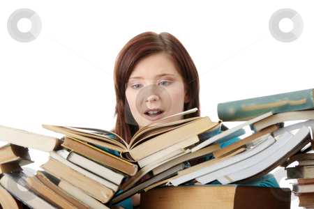 Young woman behind books Young woman behind books stock photo, Young woman behind books, isolated on white background by Piotr_Marcinski