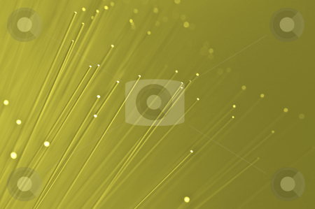 To use this stock image in your creative project, please select the size you need over to the right and click the "Add to Cart" button.
Your downloaded image will come with the Cutcaster watermark removed so don’t worry about the watermark you see on this page. Telecommunications background stock photo, Many ends of yellow illuminated fiber optic light strands close up by Samantha Craddock