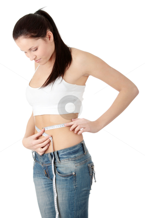 To use this stock image in your creative project, please select the size you need over to the right and click the "Add to Cart" button.
Your downloaded image will come with the Cutcaster watermark removed so don’t worry about the watermark you see on this page. Sexy, fit, young woman measuring stock photo, Sexy, fit, young woman measuring her waist by Piotr_Marcinski