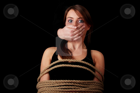 Emotional portrait of abused woman Emotional portrait of abused woman stock photo, Emotional portrait of kidnapped woman isolated on black by Piotr_Marcinski